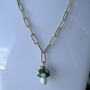 20-inch gold-plated chain with a mushroom pendant